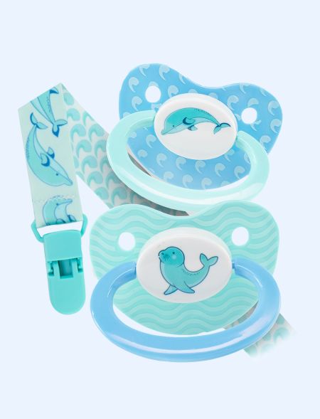 box of two pacifier dolphin...